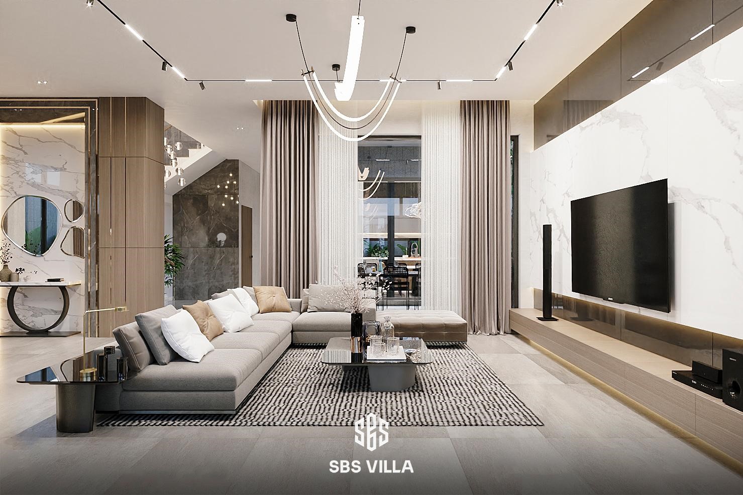 Không gian phòng khách nổi bật với tone màu tươi sáng, tạo điểm nhấn cùng hệ thống ánh sáng hiện đại